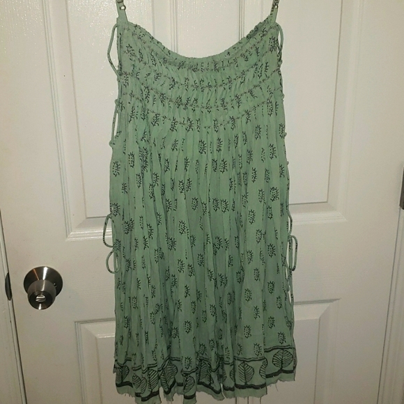 NWOT Free People  whimsical  dress with laces up the side.  Size M. NWOT - Picture 6 of 7